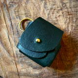 Leather Earbud Cases by Misa Gonzales