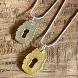 Keyhole Necklaces by A Nice World