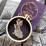 Cross-stitched Bolo Ties by The Stitching Hour