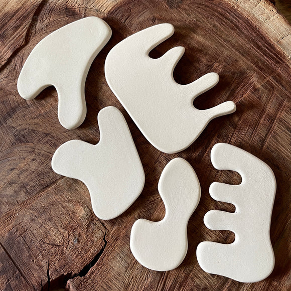 Handmade Ceramic Gua Sha Tools by Spring + Vine