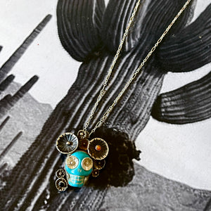 Turquoise Skull Pendants by Honeycomb Organics