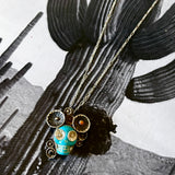Turquoise Skull Pendants by Honeycomb Organics