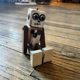 Reclaimed Wood Robots by Isaac Lange